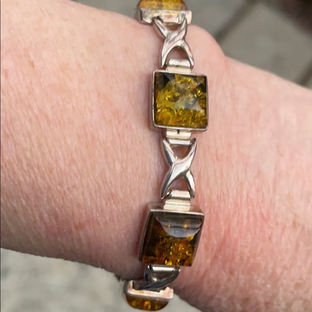 Antique sterling silver bracelet with green amber